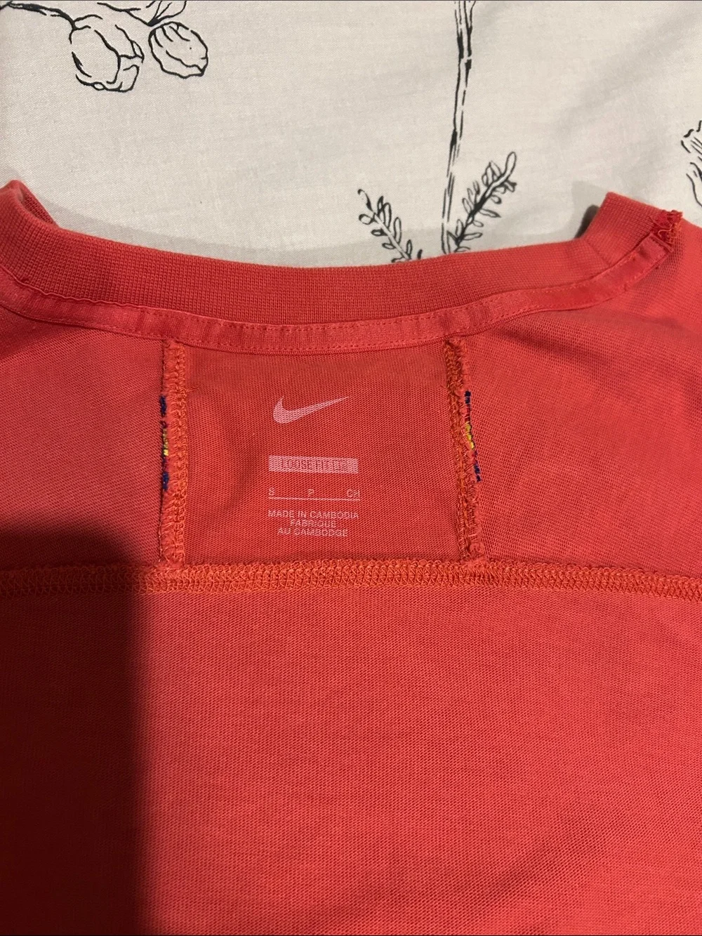 Nike Red Short-Sleeve Athletic Tee with Crest and Swoosh